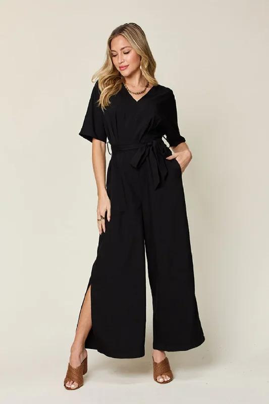Double Take Full Size V-Neck Tied Side Slit Jumpsuit Faux leather jumpsuit, Trendy, Street style, Fashionable Double Take Full Size V-Neck Tied Side Slit Jumpsuit Faux leather jumpsuit, Trendy, Street style, Fashionable
